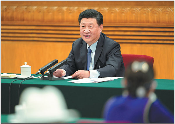 President Xi Jinping, who is also general secretary of the Communist Party of China Central Committee and chairman of the Central Military Commission, takes part in the Inner Mongolia autonomous region delegation's discussion of the Government Work Report, which Premier Li Keqiang delivered on behalf of the State Council earlier in the day, during the third session of the 13th National People's Congress in Beijing on Friday.         Huang Jingwen / Xinhua
