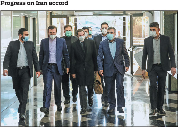 Rafael Grossi (center), directorgeneral of the International Atomic Energy Agency, seen here in Teheran, Iran, on Sunday, has said the agency reached a temporary understanding with Iran to salvage a landmark nuclear deal.Hadi Zand Via Reuters