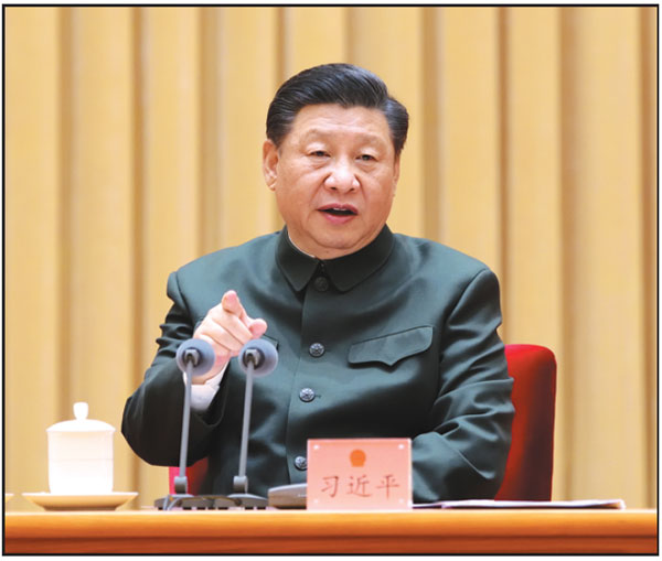 President Xi Jinping, who is also general secretary of the CPC Central Committee and chairman of the Central Military Commission, addresses a plenary meeting of the military delegation to the fourth session of the 13th NPC in Beijing on Tuesday.    Li Gang / Xinhua