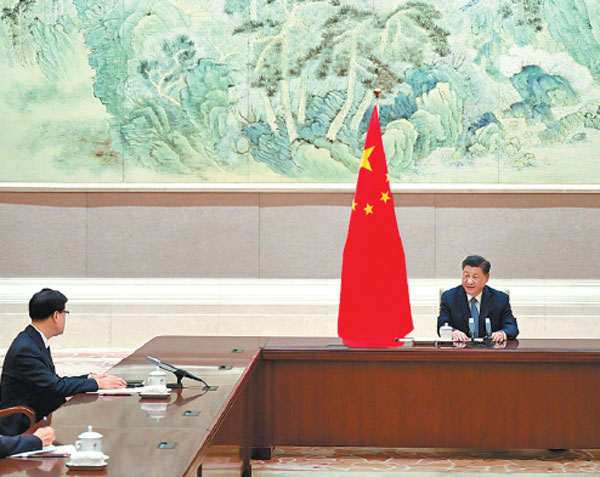 President Xi Jinping meets on Monday with John Lee, the newly appointed sixth-term chief executive of the Hong Kong Special Administrative Region, in Beijing. Lee is set to take office on July 1.Li Xueren/xinhua