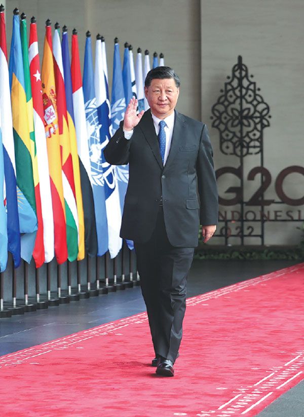 President Xi Jinping walks to the venue of the 17th summit of the Group of 20 in Bali, Indonesia, on Tuesday. Xi delivered a speech titled "Working Together to Meet the Challenges of Our Times and Build a Better Future" at the summit.Ju Peng/Xinhua