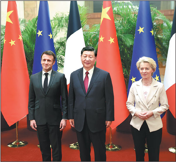 President Xi Jinping meets with French President Emmanuel Macron and European Commission President Ursula von der Leyen in the Great Hall of the People in Beijing on Thursday.Feng Yongbin/China Daily