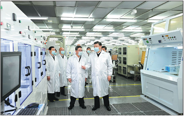 President Xi Jinping visits a research institute of China Electronics Technology Group Corp and the planning exhibition hall of a biomedical industry park during his inspection trip to Shijiazhuang, Hebei province, on Friday.    Shen Hong / Xinhua