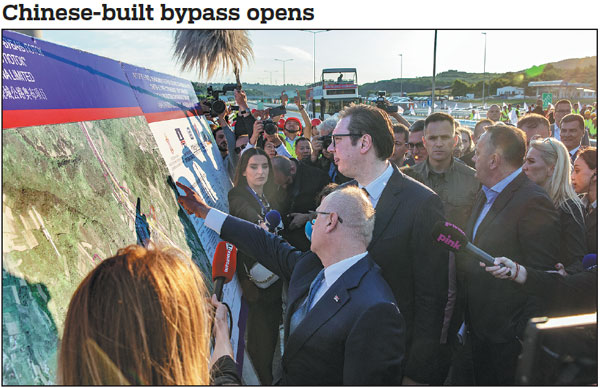 Serbian President Aleksandar Vucic (center) takes part in a ceremony on Wednesday to mark the opening of a new bypass section in the Serbian capital, Belgrade. Built by the Power Construction Corporation of China, the 9.74 kilometer road, which runs from the Strazevica tunnel to the Bubanj Potok interchange, is the final section of the Belgrade bypass.       Wang Wei / Xinhua
