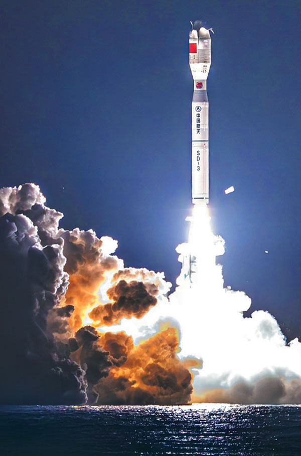 A Smart Dragon 3 carrier rocket is launched on Wednesday, off the coast of Yangjiang in Guangdong province, marking China's first sea-based space launch mission in the South China Sea.Zhang Jingyi/For China Daily