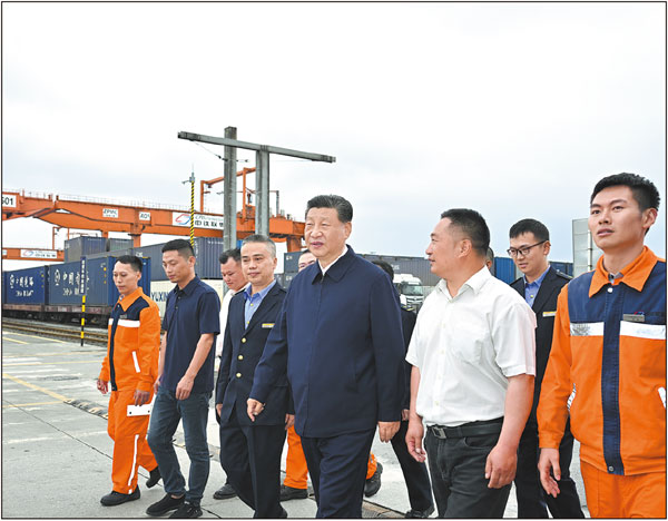 President Xi Jinping, who is also general secretary of the Communist Party of China Central Committee, inspects the Chongqing International Logistics Hub Park on Monday. YUE YUEWEI/XINHUA