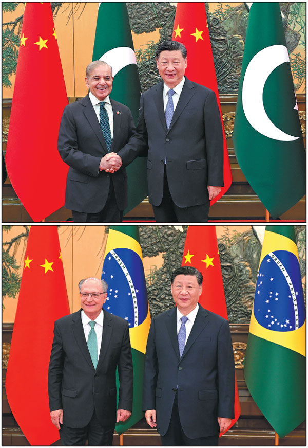 Top: President Xi Jinping shakes hands with Pakistani Prime Minister Shehbaz Sharif at the Great Hall of the People in Beijing on Friday. Wang Zhuangfei / China Daily; above: President Xi Jinping meets with Brazilian Vice-President Geraldo Alckmin at the Great Hall of the People in Beijing on Friday. Shen Hong / Xinhua