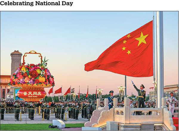 A grand flag-raising ceremony is held at Tian'anmen Square in Beijing on Tuesday to celebrate the 75th anniversary of the founding of the People's Republic of China.Zhang Wujun/For China Daily