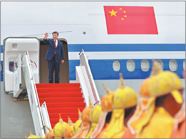 President Xi Jinping waves goodbye to the crowd as he boards a plane to depart from Phnom Penh, Cambodia, for Beijing, concluding his state visits to Vietnam, Malaysia and Cambodia.Feng Yongbin/China Daily
