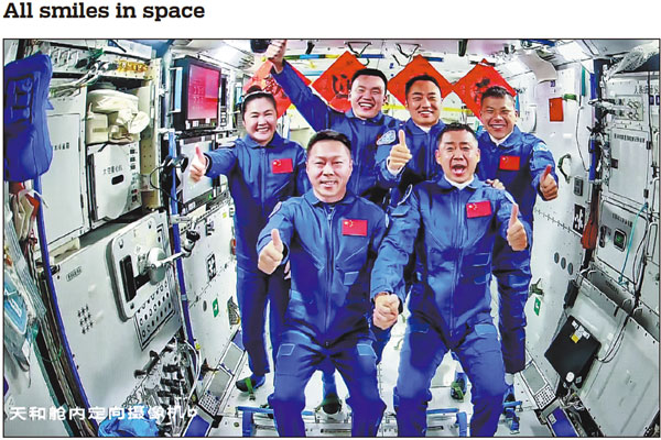 The crews of the Shenzhou XIX and Shenzhou XX manned spaceships pose for a group photo in the Tiangong space station on Friday. The three astronauts aboard China's Shenzhou XX spaceship entered the country's space station and met with their fellow astronaut trio in the early hours of Friday, starting their in-orbit crew handover. XU BU / FOR CHINA DAILY See story, page 3