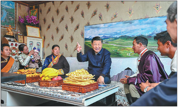 President Xi Jinping visits the home of a herdsman in a village of Gangca county, Haibei Tibetan autonomous prefecture, in Northwest China's Qinghai province on Tuesday.    Xie Huanchi / Xinhua