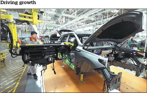 An employee assembles a car at a factory in Jimo district, Qingdao, Shandong province, on Sept 21. Jimo is home to more than 400 carmakers and manufacturers of auto parts, which have seen a continuous increase in orders recently. China's major industrial companies saw their profits rebound strongly in August, surging 17.2 percent year-on-year, according to data released by the National Bureau of Statistics on Wednesday.China Daily