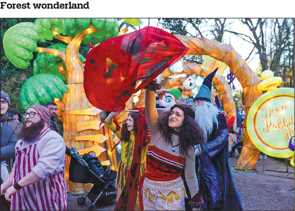 Actors and actresses perform during the international Lanternia festival held at the Fairy Tale Forest theme park in Cassino, Italy, on Sunday. Covering 110,000 square meters, the festival features more than 300 giant lanterns handcrafted by artisans from Zigong in Southwest China's Sichuan province. The festival will run through March 10.Li Jing/Xinhua
