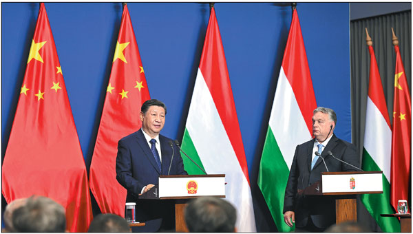 President Xi Jinping speaks during his joint press conference with Hungarian Prime Minister Viktor Orban following their talks in Budapest, Hungary, on Thursday.    Xie Huanchi / Xinhua