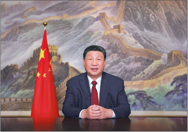 President Xi Jinping delivers a New Year message on Tuesday evening in Beijing to ring in 2025. JU PENG/XINHUA