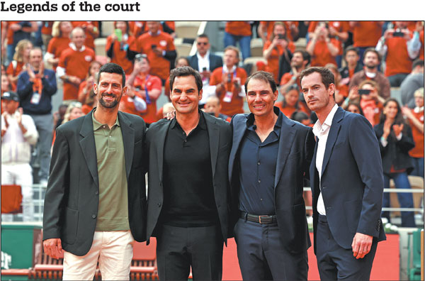 Novak Djokovic, Roger Federer, Rafael Nadal and Andy Murray (from left to right) pose for a group photo on Sunday during a farewell ceremony for 14-time French Open champion Nadal at the Roland Garros stadium in Paris, France. Thousands of spectators cheered Nadal, who retired last November, with thunderous applause and chants as the "King of Clay" stepped onto the Court Philippe-Chatrier. The Big Four of the sport, with 69 Grand Slam titles between them, symbolize a golden era in men's tennis.Li Jing/Xinhua