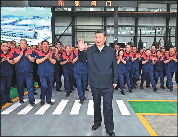 President Xi Jinping, who is also general secretary of the Communist Party of China Central Committee and chairman of the Central Military Commission, visits Yangquan Valve Co in Yangquan, Shanxi province, on Monday afternoon.Yan Yan/Xinhua